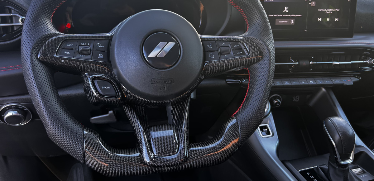 Dodge Hornet Custom Steering Wheel - Carbon Fiber - Flat Top/ Flat Bottom - w/ 2 Red Center Stripes - Perforated Leather
